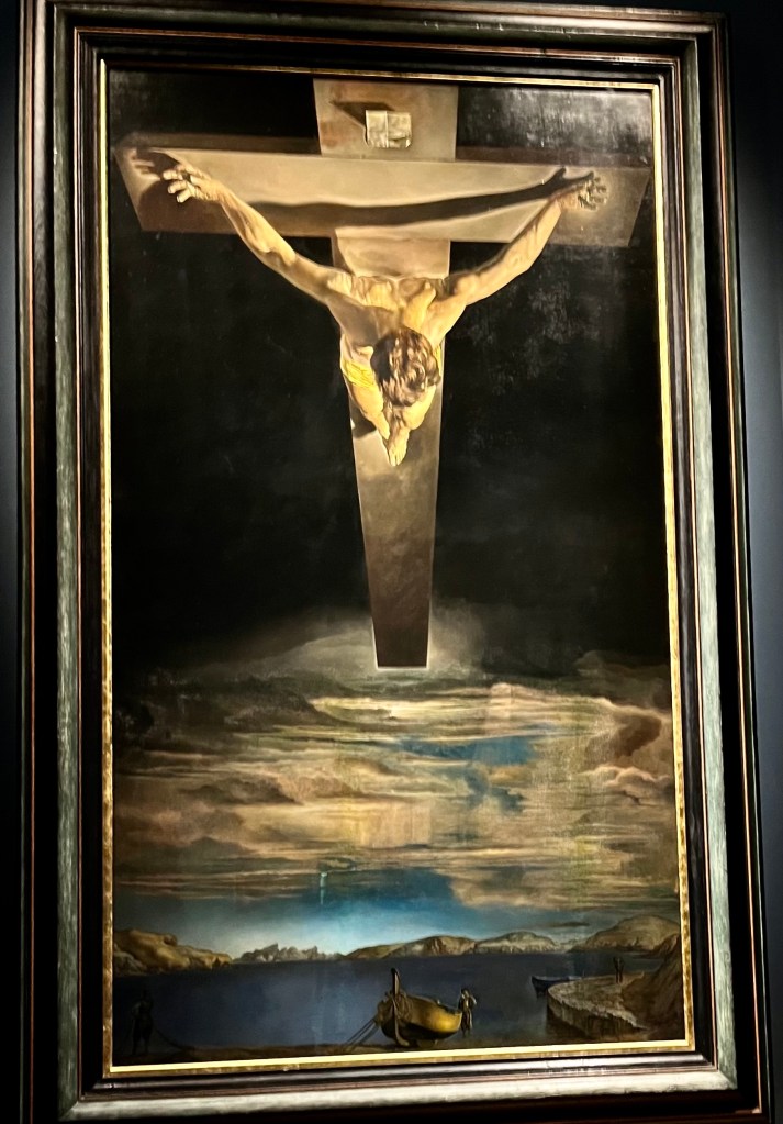A surreal painting depicting a crucifixion scene with a figure on the cross, set against a dark sky and distorted landscape.